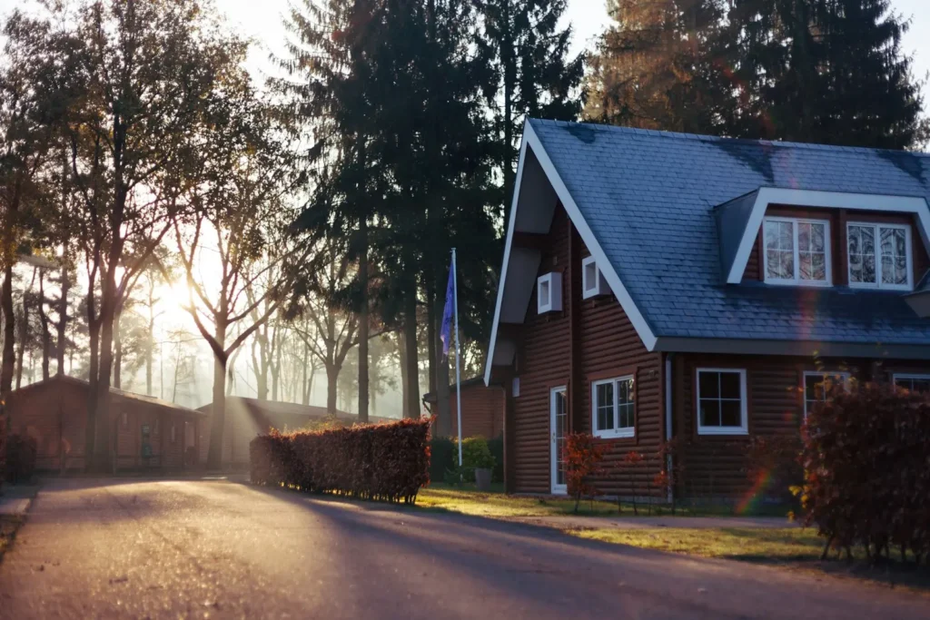 Log home exterior with large windows